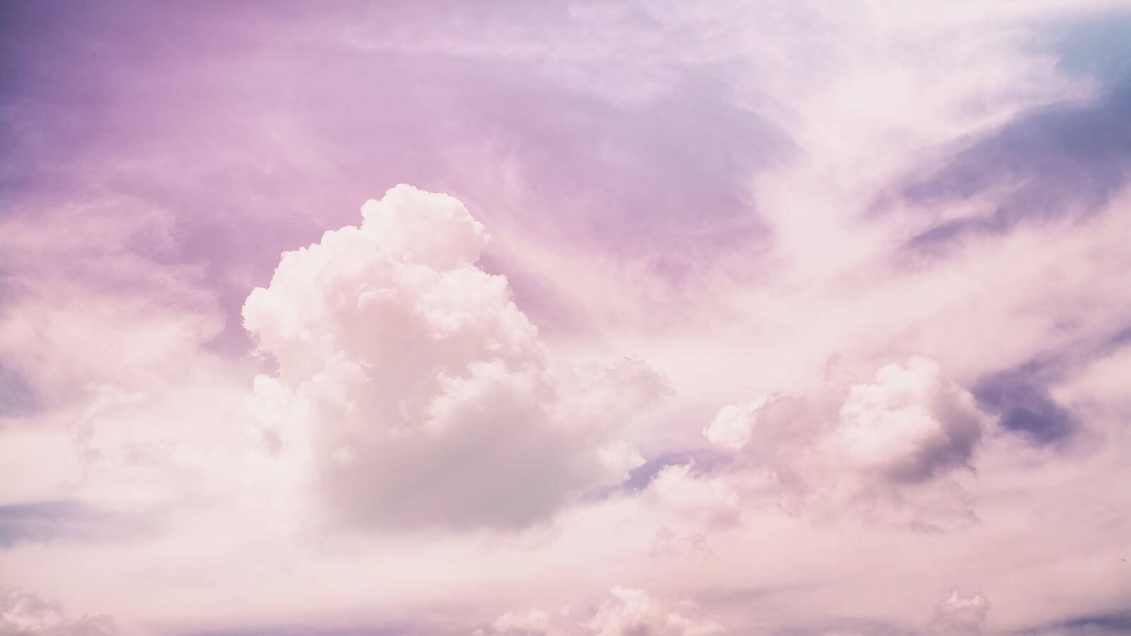 Clouds in a pink and purple sky.