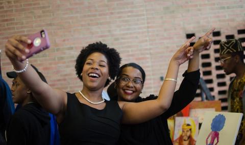 Women taking a selfie together.